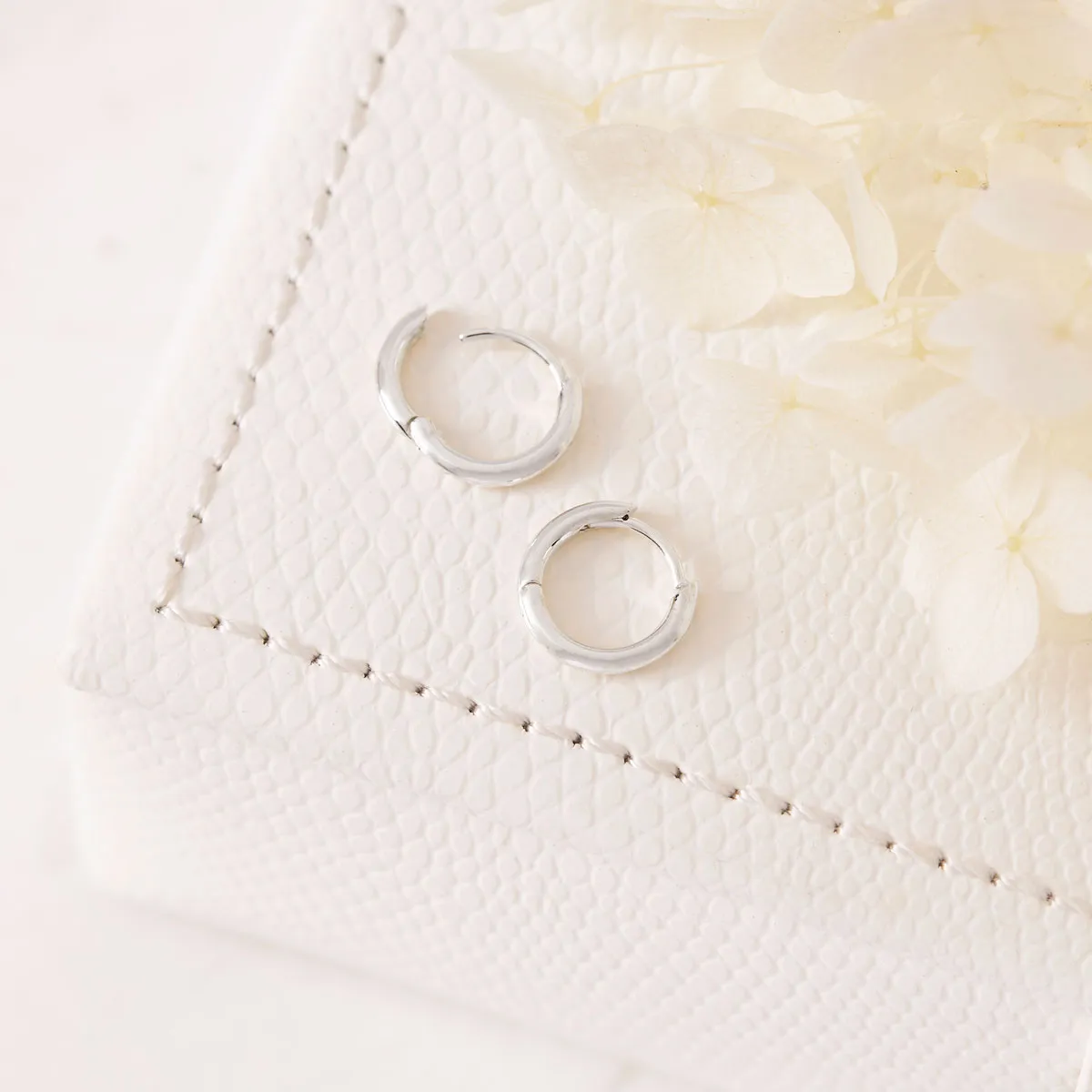 Delicate Silver Round Huggies