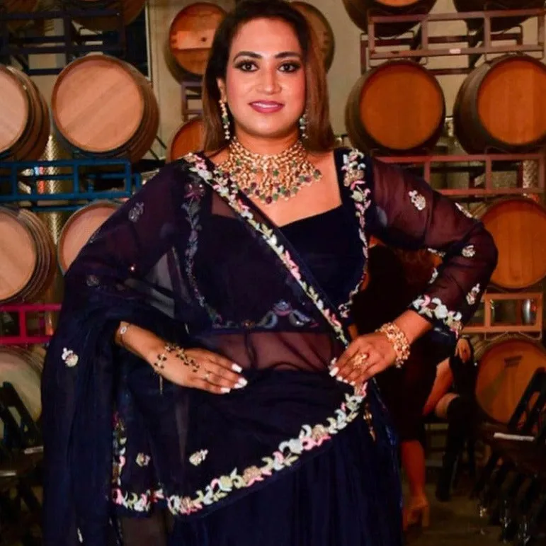 Kanika Purple Green Kundan Set