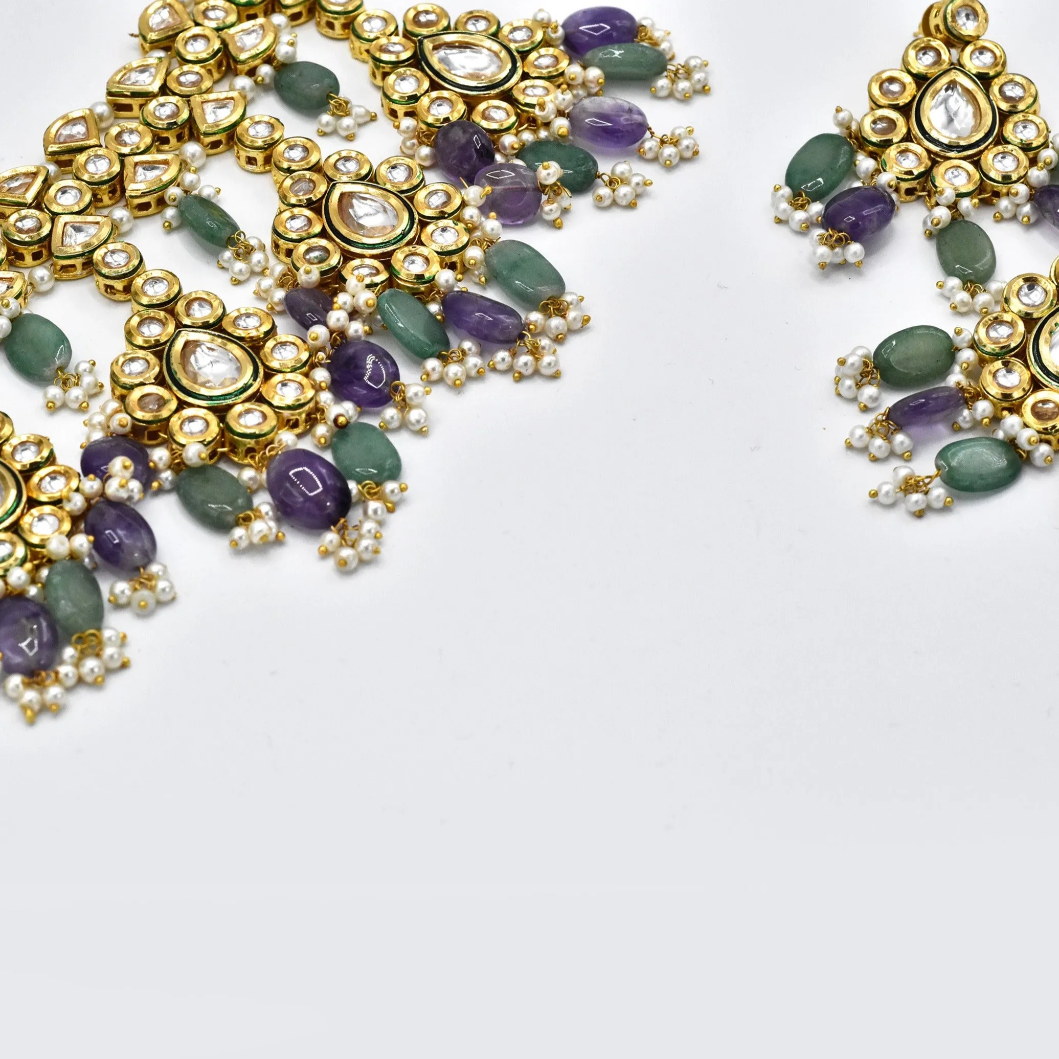 Kanika Purple Green Kundan Set