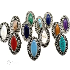 Marquise Shaped Gemstone Ring With Vintage Shield Border