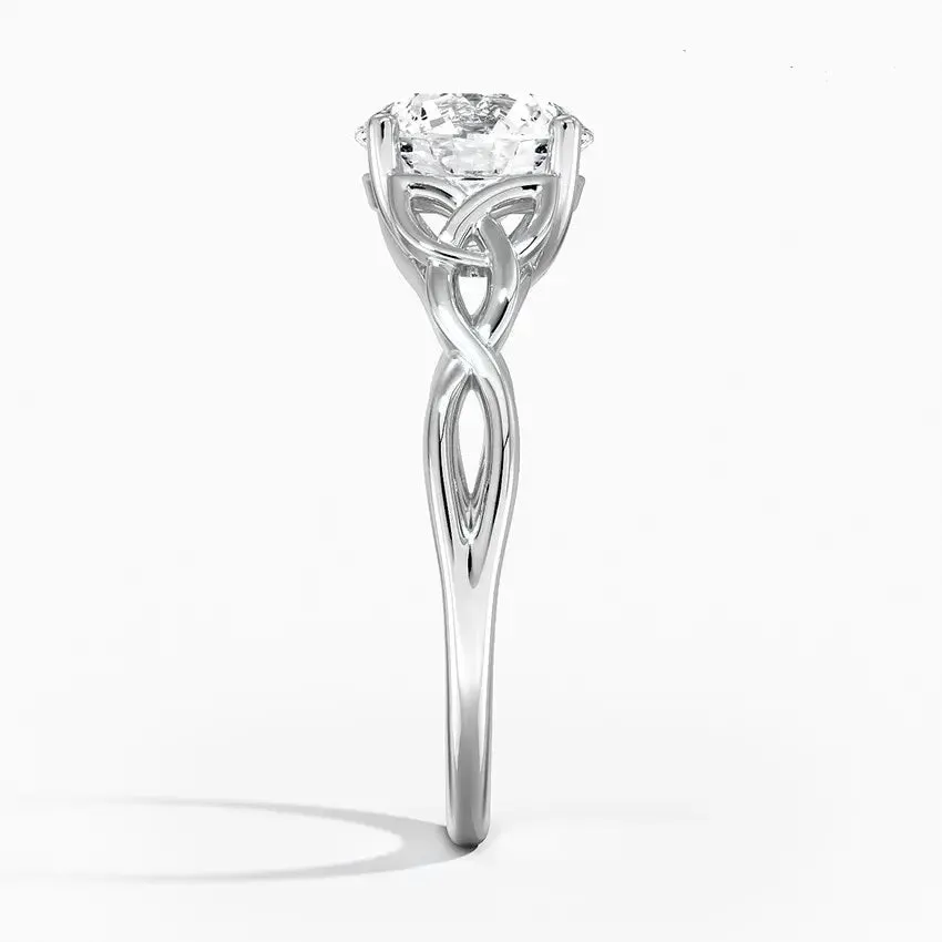 Round-Cut Solitaire Engagement Ring with Four-Claw Setting and Twisted Infinity Band