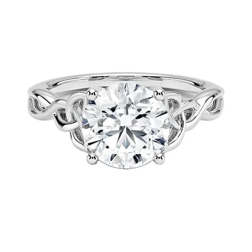 Round-Cut Solitaire Engagement Ring with Four-Claw Setting and Twisted Infinity Band